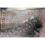 3 MIDDLE EASTERN RUGS Condition Report: Carpet has large areas of wear.