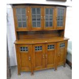 OAK ARTS & CRAFTS SIDEBOARD WITH 4 LEADED GLASS DOORS OVER 4 PANEL & LEADED GLASS DOORS BELOW