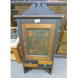 EARLY 20TH CENTURY WALL MOUNTED CABINET WITH PANEL DOOR DECORATED WITH GAMBLING MONK