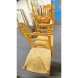 TWO PINE LADDER BACKED CHAIRS WITH WICKER BASES