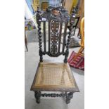 OAK BERGERE CHAIR WITH CARVED & BARLEY TWIST DECORATION