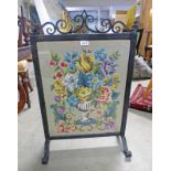 CAST IRON FIRE SCREEN WITH TAPESTRY WORK TOGETHER WITH PINE SHELVING UNIT,