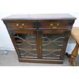 OAK BOOKCASE WITH 2 DRAWERS OVER 2 ASTRAGAL GLAZED DOORS ON PLINTH BASE Condition Report: