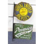 TWO ENAMEL DOUBLE SIDED ADVERTISING SIGNS ON METAL BRACKET: A CIRCULAR "ROYAL ENFIELD BICYCLES MADE