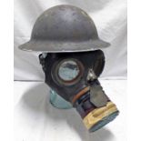 WW2 BRITISH BRODIE HELMET WITH MARKINGS TO INTERIOR AND A 39 DATED NORMAL SIZED GAS MASK