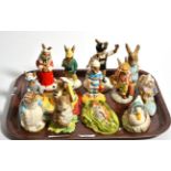 Royal Doulton Bunnkykins, three Royal Albert Beatrix Potter models and two others (13)