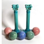 A pair of Burmantoft's turquoise glaze Corinthian column candlesticks; together with five