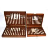 An oak cased Mappin & Webb 'Princes Plate' set of twelve fish knives and forks, crested; together