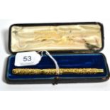 A Mabie Todd ''Swan'' fountain pen, with repousse snail pattern decoration, in a fitted case