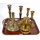 A pair of Victorian copper candlesticks (formerly plated); a pair of brass candlesticks and two