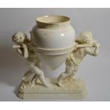 A Victorian blanc de chine centrepiece, cherubs carrying amphora on integral base, 32cm height