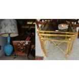 Art Nouveau copper coal bin; a nest of three brass and glass tables; wooden bellows; and a blue