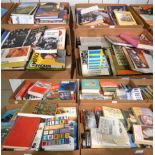 Twenty-nine boxes of books, mostly paperback and hardback novels, together with a small number of