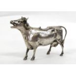 A Continental Silver Cow Creamer, indistinct marks, possibly Hanau, naturalistically modelled and