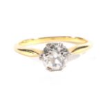 An Solitaire Old Cut Diamond Ring, in a double claw setting, to tapering shoulders, estimated