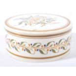 A Prattware Circular Snuff Box and Screw Top, circa 1800, typically painted with stylised flowers