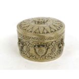 A South East Asian White Metal Circular Box and Cover, marked DC 90, circa 1900, decorated in relief