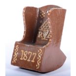A Slipware Rocking Chair, dated 1877, in the form of a lambing chair, inscribed RA 1877, 16.5cm