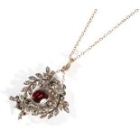 A Garnet and Rose Cut Diamond Pendant, on Chain, a foil backed oval cut garnet within a rose cut