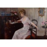Percy Sturdee (1861-1939) Portrait of an elegant lady, seated at her desk, writing a letter Signed
