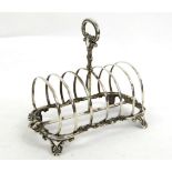 A Victorian Silver Toast Rack, Henry Wilkinson & Co, Sheffield 1851, the scrolling foliate frame