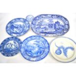 A Staffordshire Pearlware Platter, circa 1820, printed in underglaze blue with The Fort of Madura