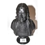 A Wedgwood Black Basalt Bust of Wesley, early 19th century, on a circular socle, impressed mark,