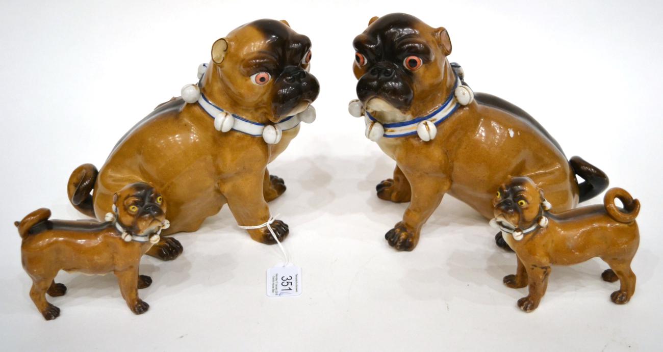 A Pair of Meissen Style Porcelain Figures of Pugs, circa 1900, naturalistically modelled and painted
