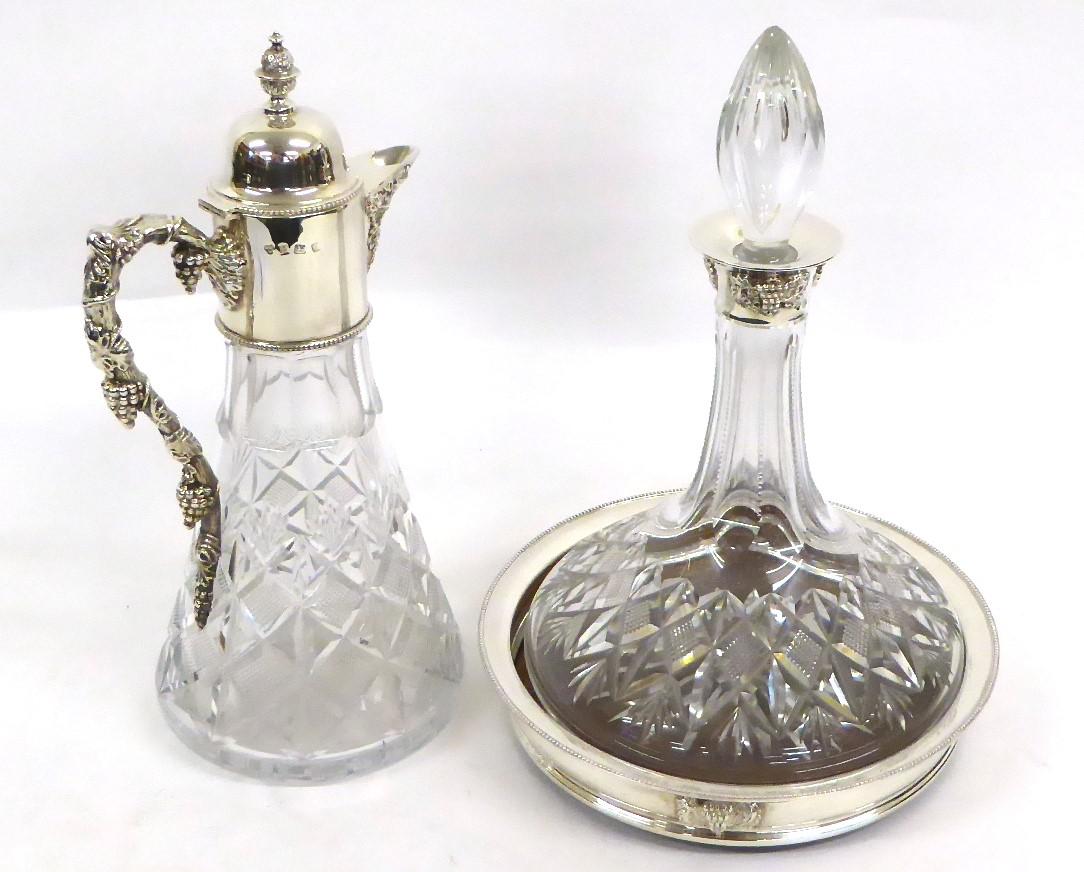 A Silver Mounted Claret Jug, Ship's Decanter and Coaster, Warwickshire Reproduction Silver,