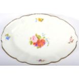 A Swansea Porcelain Oval Dish, circa 1820, painted with a flowerspray and scattered sprig within a