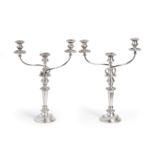 A Pair of George III Silver Candlesticks, S C Younge & Co, Sheffield 1812, with Old Sheffield