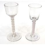 A Wine Glass, circa 1750, the vertically fluted ogee bowl on an opaque twist stem, 15.5cm high;