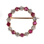 A Ruby and Diamond Hoop Brooch, of alternating round cut rubies and old cut diamonds, total