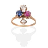 A Sapphire, Ruby and Diamond Clover Ring, round cut stones to a diamond set stem, estimated