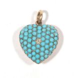 A Victorian Turquoise and Old Cut Diamond Heart Pendant, measures 2.5cm by 1.8cm . The pendant is in