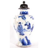 A Chinese Porcelain Baluster Vase, in Kangxi style, painted in underglaze blue with a procession,