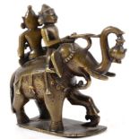 A South-East Asian Bronze Figure of an Elephant and Two Riders, in 17th century style, holding a