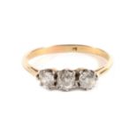 An Old Cut Diamond Three Stone Ring, in claw settings, to tapered shoulders, total estimated diamond