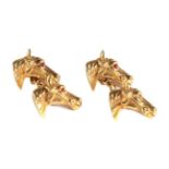 A Pair of Chain Linked Double Horse Head Cufflinks, with ruby set eyes One ruby deficient . The