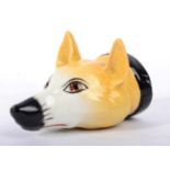 A Pearlware Fox Mask Stirrup Cup, early 19th century, naturalistically modelled and painted with a