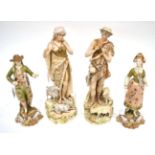 A Pair of Royal Dux Style Porcelain Figures of a Shepherd and Shepherdess, circa 1910, standing in