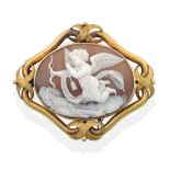 A Nineteenth Century Shell Cameo Brooch, Depicting Cupid, modelled in flight with bow and arrow,