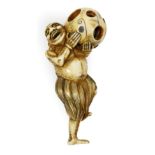 A Japanese Ivory Netsuke, Edo period, carved as a South Sea islander wearing a grass skirt holding a