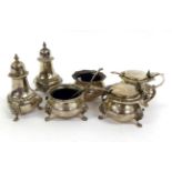 A Six Piece Silver Condiment Set, Fowler & Polglaze, London 1925, comprising: a pair of open