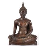 A Bronze Figure of Buddha, probably Burmese, 18th/19th century, seated in traditional pose on a