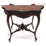 A Victorian Burr Walnut and Ebonised Foldover Card Table, late 19th century, of serpentine shaped