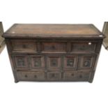 A Joined and Carved Oak Sideboard, the top with a gadrooned carved border and fluted frieze above