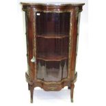 A French Louis XV Style Rosewood and Gilt Metal Mounted Serpentine Shaped Vitrine, late 19th/early