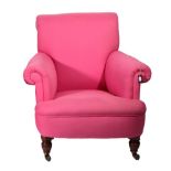 A Victorian Armchair, circa 1880, covered in pink cotton fabric with rounded arms and overstuffed