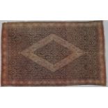 Senneh Rug Iranian Kurdistan, circa 1900 The charcoal Herati field centred by a stepped medallion